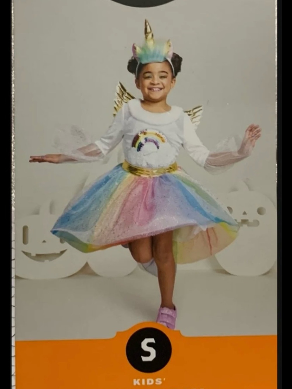 New girls size small (6/7) sequined shimmery rainbow colored unicorn costume